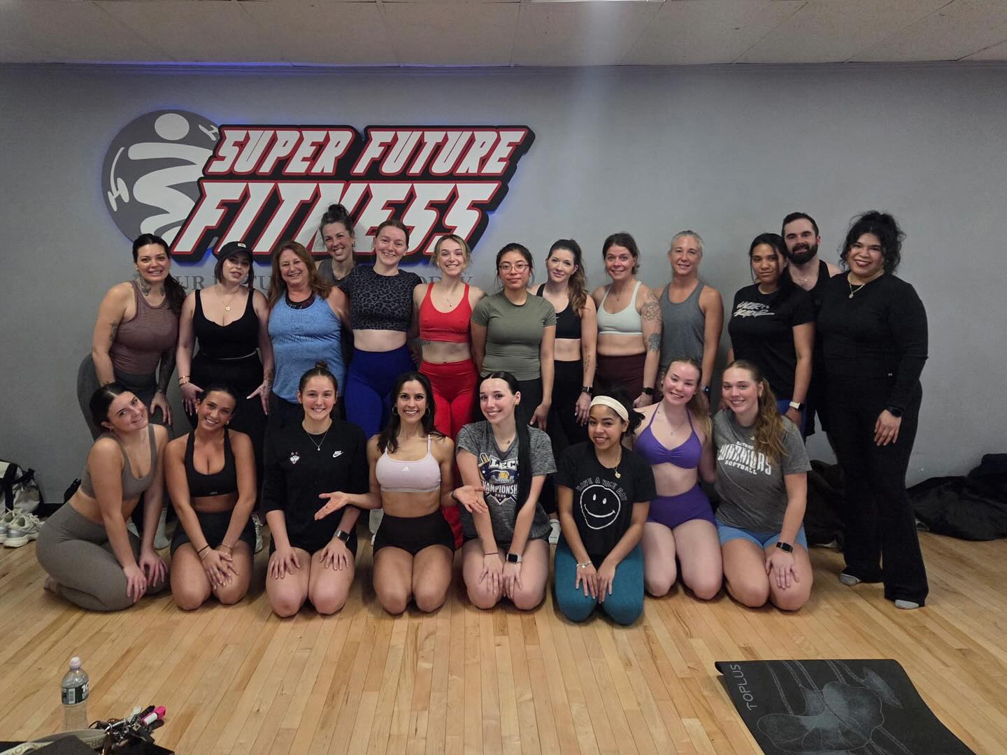 Large group of women smiling together in the SFF studio